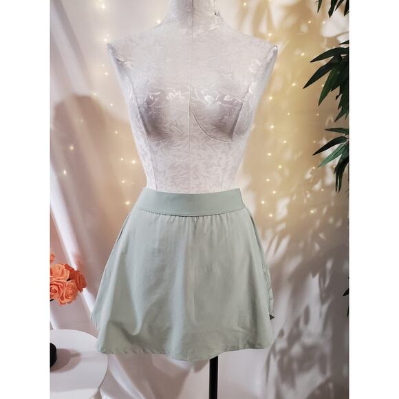 TnAction Aritzia TnaMOVE Micro Tennis Rally Skirt Skort Womens 2XL Sage Green - Picture 1 of 12